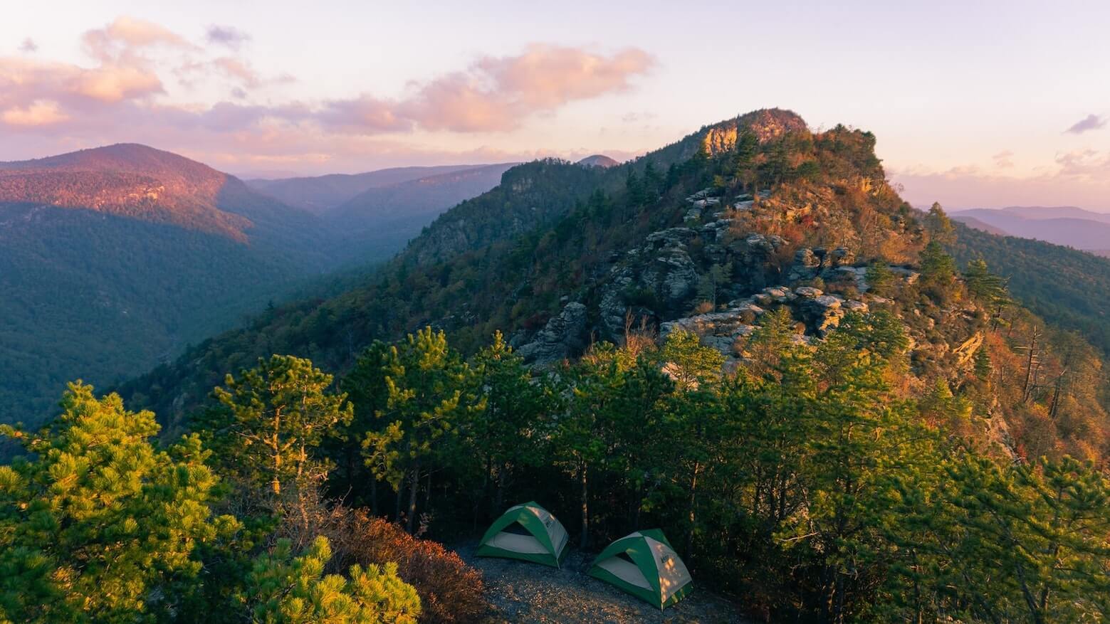 Sleeping Bags Buyers Guide - Tents in Mountain Scenery